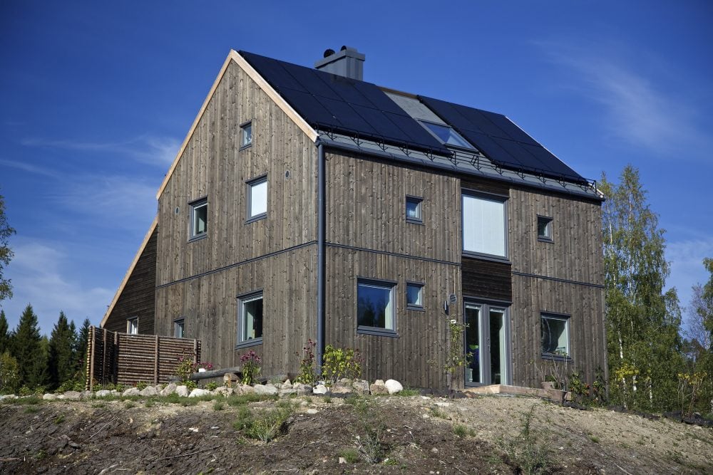 Hurdal økolandsby bygget i Superwood træ i farven jern
